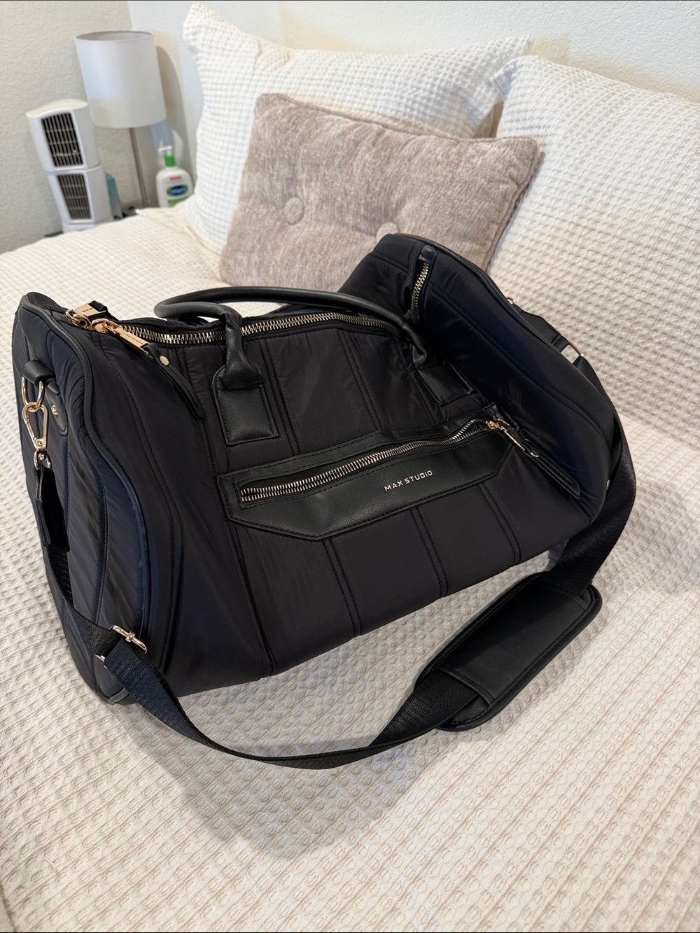 Max Studio Black Quilted Duffel Bag with Shoulder Strap and interior zip pocket